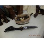 A pair of vintage tailors shears and iron