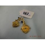 Two Greek yellow metal christening charms weight 8 grams