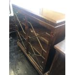 A mahogany glazed bookcase