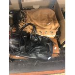 Two AllSaints bags plus one other and an old suitcase