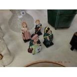 Four Royal Doulton Dickens figures