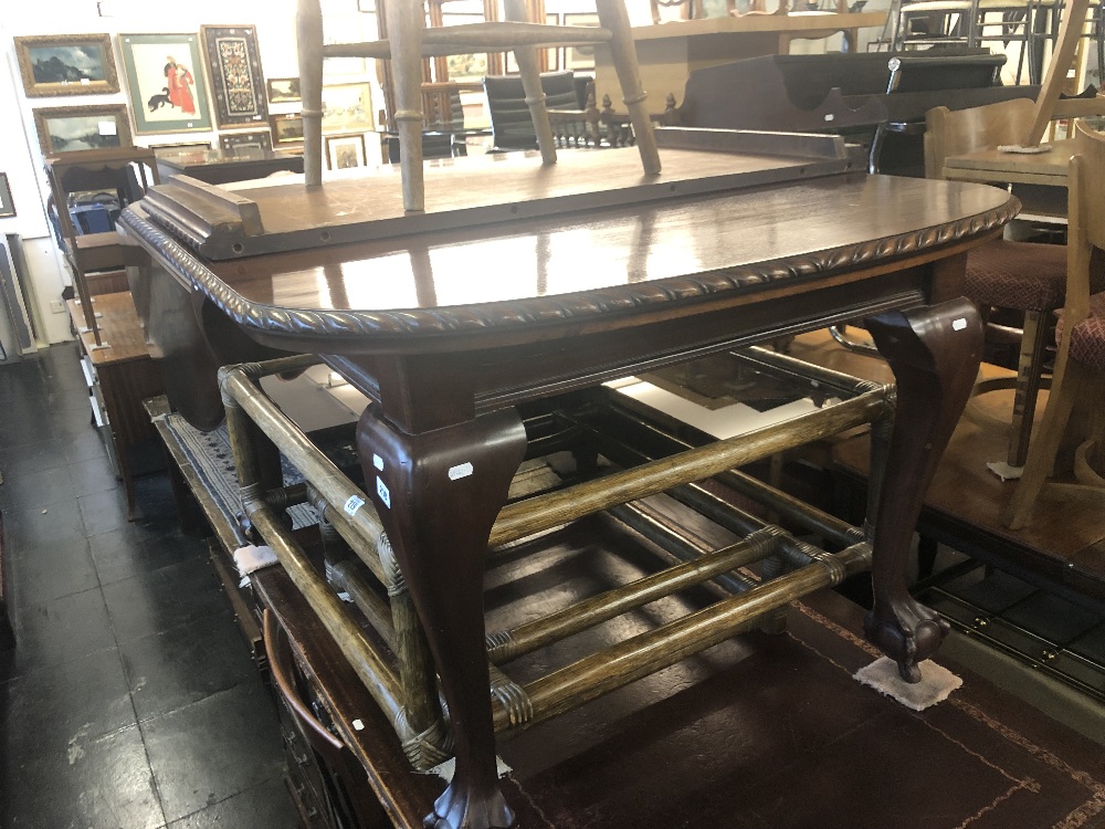 A mahogany extending dining,