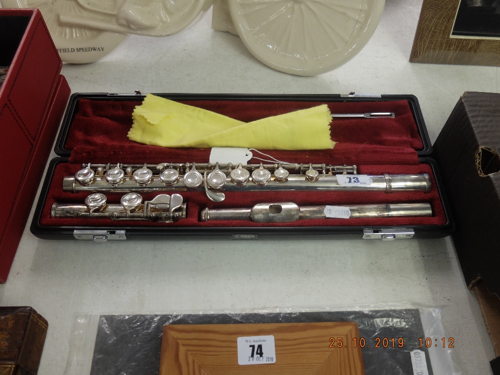 A cased Yamaha flute