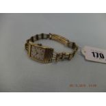 An art deco Bulova watch A/F case marked 14k solid gold