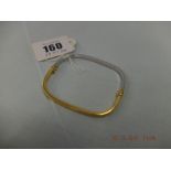 A yellow and white gold bangle marked 916 22k weight 10 grams