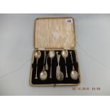 A boxed set of silver tea spoons