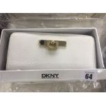 A DKNY white purse, leather, brand new unused, still has labels etc.