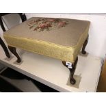 A tapestry foot stool