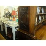 A mahogany bookcase on cupboard base