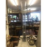 A tall slender glass vase