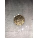 A 1938 Egyptian King Farouk gold 100 Piastres coin