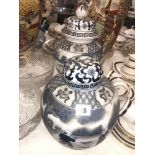 Two blue and white lidded vases