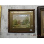 A framed and glazed watercolour country scene