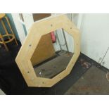 An octagonal stone mirror