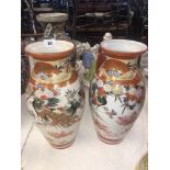 A pair of oriental vases