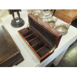 A six division walnut watch box (three cushions missing)