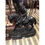 A bronze horse and jockey