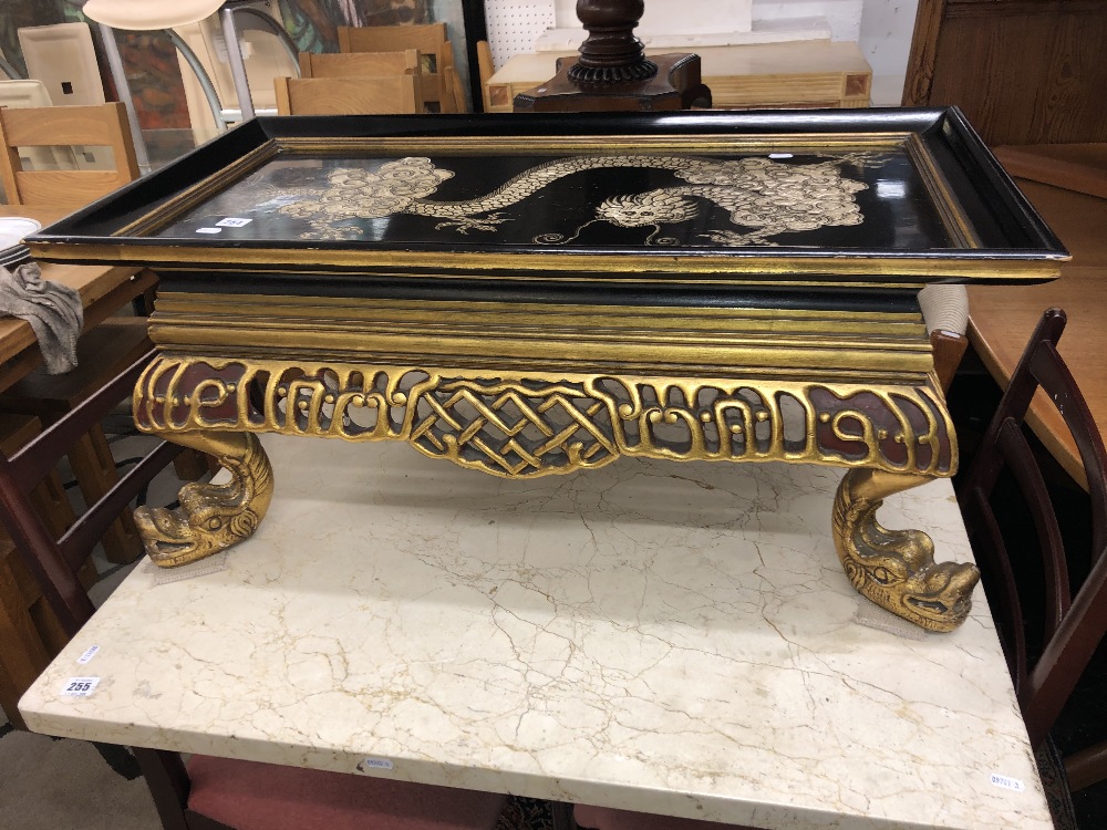 An oriental 'dragon' side table