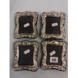 A set of four hm silver photo frames