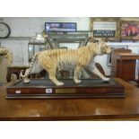 A decorative tiger on stand "on the prowl"