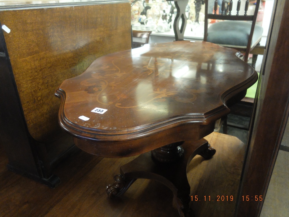 An inlaid Italian coffee table