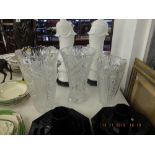 Three large cut glass vases
