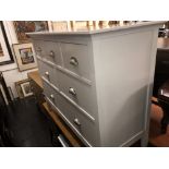 A modern John Lewis white painted chest of six drawers