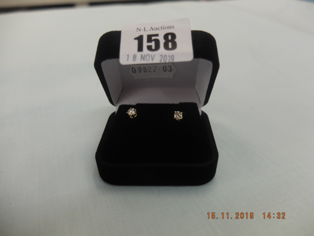 A pair of 18ct gold and diamond stud earrings approximately 0. - Image 2 of 2