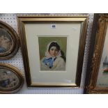 A gilt framed watercolour portrait signed L.