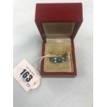 A 9ct yellow gold turquoise and pearl ring size M