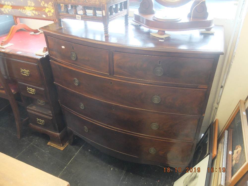 A 19th Century Georgian mahogany chest of drawers on bracket feet