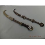 Two Arabic daggers