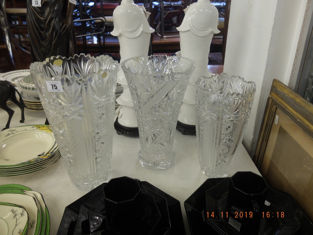 Three large cut glass vases