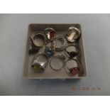 Ten assorted silver gem set rings