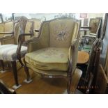 A pair of tapestry and walnut tub chairs