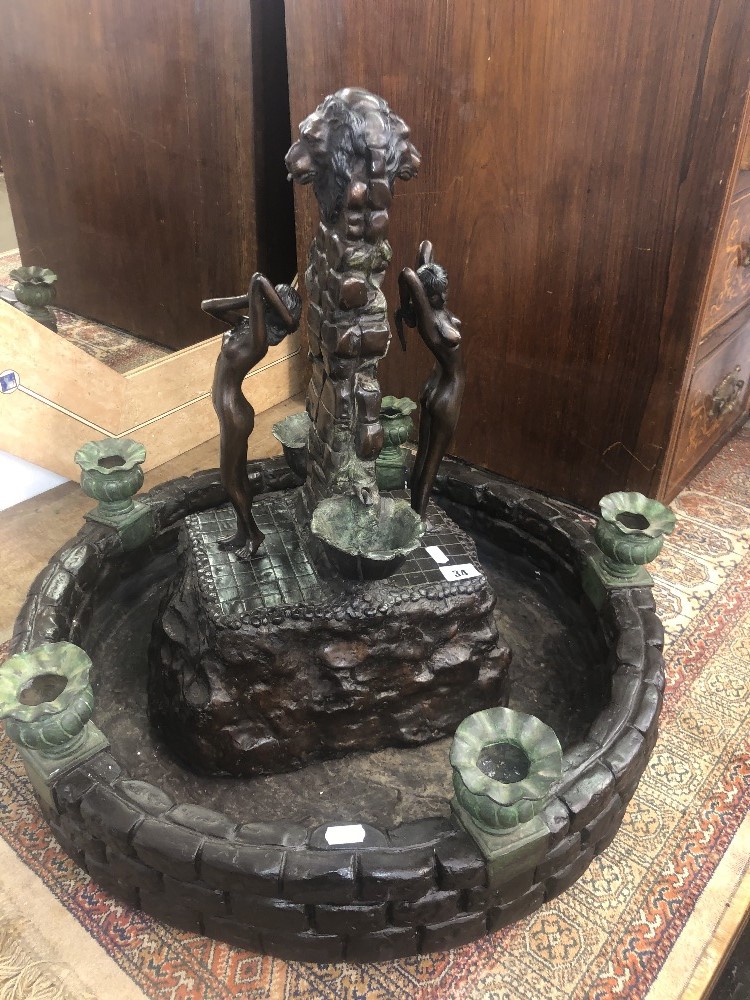 A bronze indoor fountain