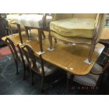 A mahogany Regency style table and six chairs