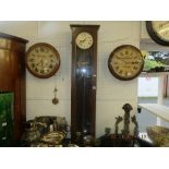 A mahogany wall clock