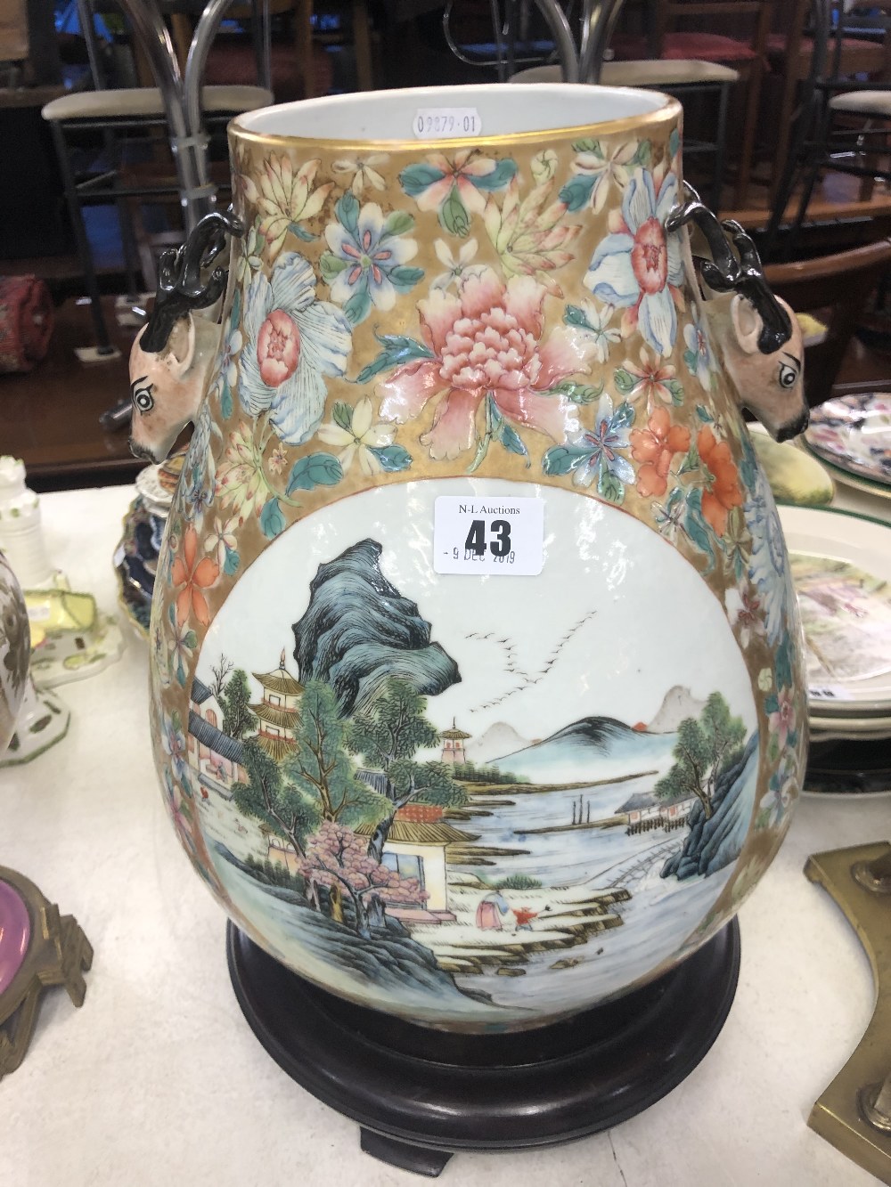 A Chinese famille rose vase with deer head handles with seal mark to base, approx.