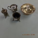 A Three piece hallmarked silver cruet set and a silver bowl