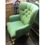 An upholstered bedroom chair