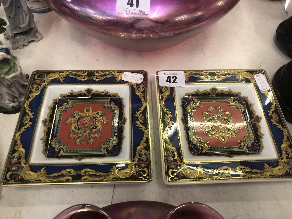 A pair of Versace Rosenthal porcelain Le Roi Soleil ashtrays