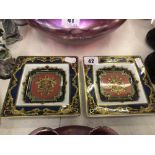 A pair of Versace Rosenthal porcelain Le Roi Soleil ashtrays