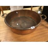 A 19th century copper jam warming pan