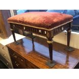 A decorative duet piano stool