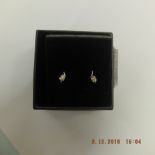 A pair of 18ct white gold and diamond earrings