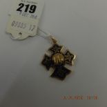 An 18ct gold and enamel cross pendant weight 11 grams