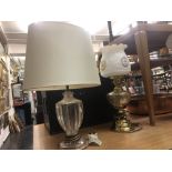 A glass table lamp and another