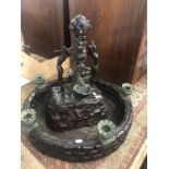 A bronze indoor fountain