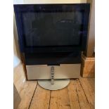 A Bang & Olufsen television and remote